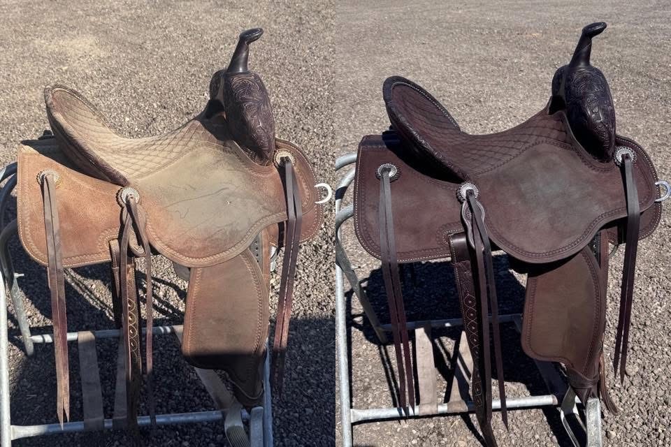 Hand lifting the leather skirt of a Martin saddle to reveal the stamped serial number.