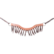 Steer roper breastcollar with blood knots, seen from the front. Dark latigo strings hang in a fringe along the 2-inch harness leather strap, with a ring at each end and buckled tug straps.
