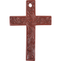 Leather cross air freshener, seen from the front. Scroll tooling fills the reddish brown leather, with a hole at the top for hanging.