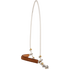 Rope headsetter tiedown with a leather nose, seen from the front quarter. White rope forms the poll loop, and a stitched leather cover wraps the noseband between knots and rings.
