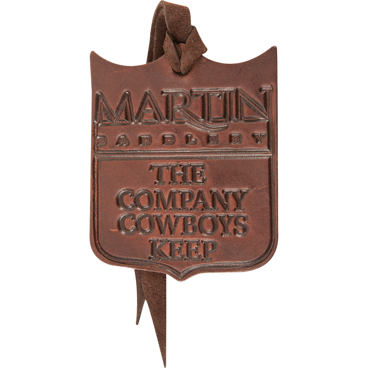 Leather air freshener, seen from the front. The brown shield shaped leather is stamped with the Martin Saddlery name and the words The Company Cowboys Keep, with a leather hanging tie.