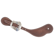 Chocolate roughout cowboy spur strap with a Salinas buckle, seen from above. White stitching edges the roughout leather, and the engraved shaped buckle sits near the narrow end.