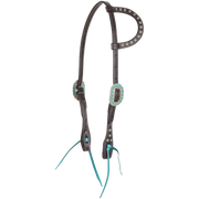 Chocolate slip ear headstall with turquoise buckles, seen from the front quarter. Antiqued dots line the ear loop and cheeks of the chocolate skirting leather, with turquoise ties at the bit ends.