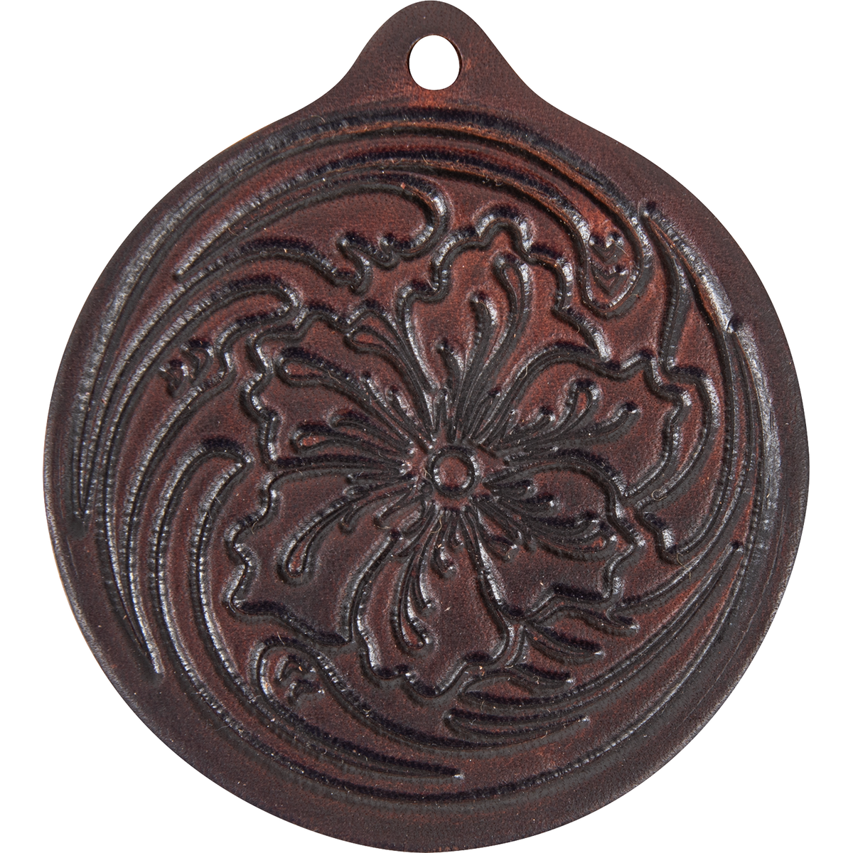 Floral leather air freshener from Martin Saddlery, seen from the front. A tooled flower with swirling leaves fills the round dark brown leather, with a hole at the top for hanging.