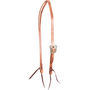 Natural harness leather split ear headstall with a Salinas buckle, seen from the front quarter. The engraved, shaped buckle sits on the cheek of the 5/8-inch strap above latigo bit ties.