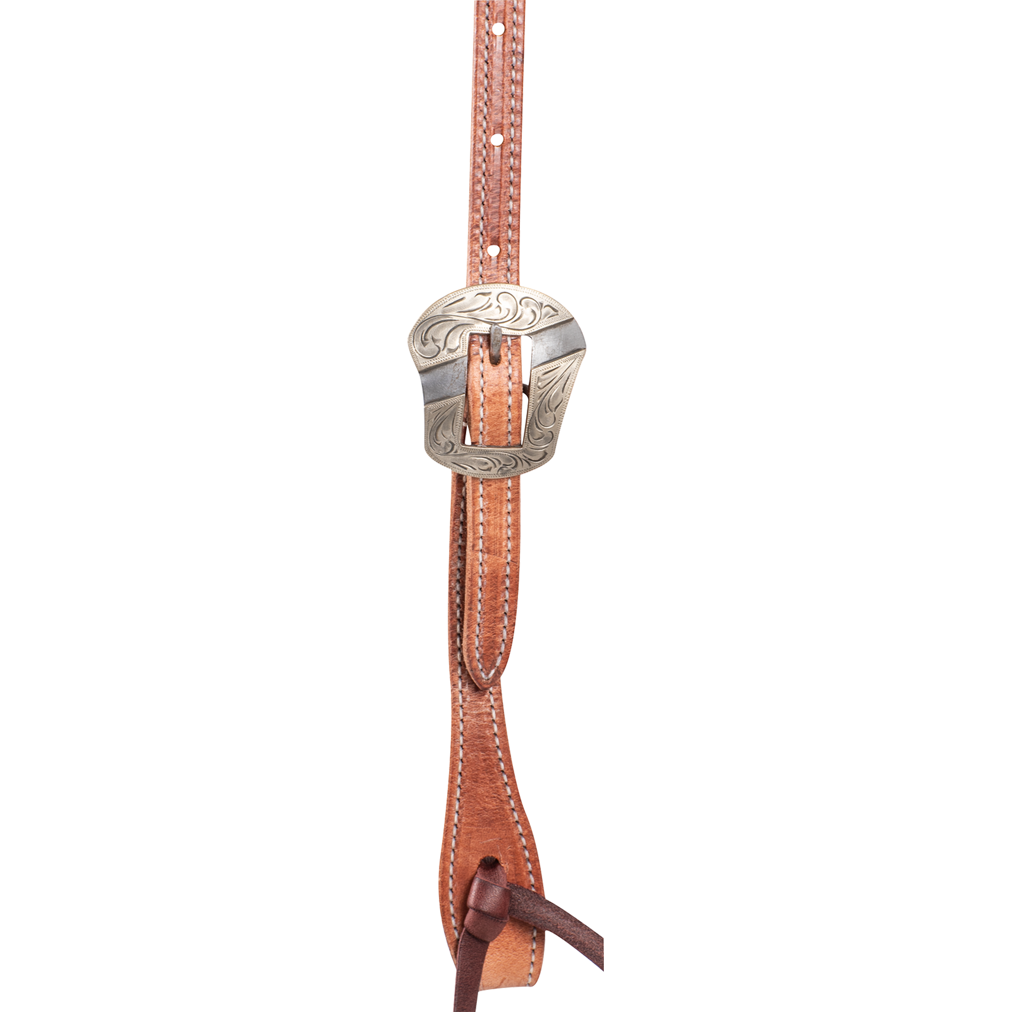 Harness leather headstall cheek seen up close, with an engraved Salinas buckle above a latigo bit tie. Stitching runs down both edges of this Martin Saddlery headstall for a horse.
