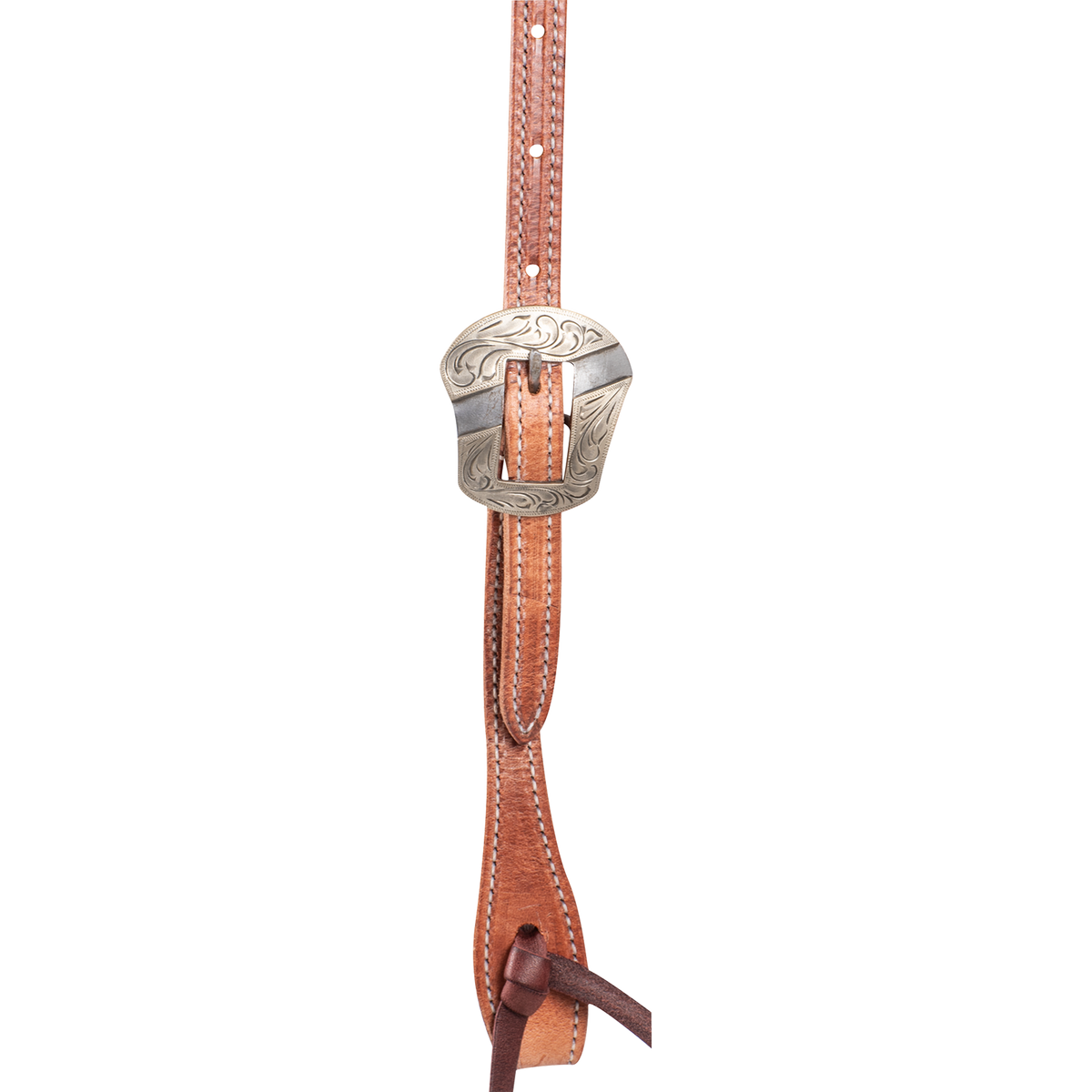 Harness leather headstall cheek seen up close, with an engraved Salinas buckle above a latigo bit tie. Stitching runs down both edges of this Martin Saddlery headstall for a horse.