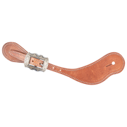 Natural harness leather cowboy spur strap with a Prescott buckle, seen from above. White stitching outlines the strap, and the scalloped engraved buckle sits near the narrow end.