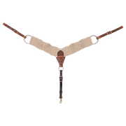 Natural mohair breast collar from Martin Saddlery, seen from the front in full. Natural mohair strands form the 3-inch shoulder straps, which join a leather center piece with rings, with buckled tug straps and a tie-down strap ending in a snap.