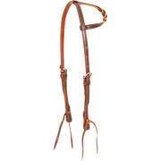 Slip ear headstall with natural blood knots, seen from the front quarter. Light and dark leather blood knots wrap the ear loop of the 5/8-inch harness leather headstall, which has stainless steel buckles and bit ties.