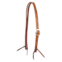 Ranahan headstall in natural skirting leather with weathered, antiqued vine tooling, seen from the front quarter. The tooled cheek carries a cart buckle, and both ends finish in bit ties.