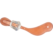 Natural harness leather cowboy spur strap with a Salinas buckle, seen from above. White stitching edges the leather, and the engraved shaped buckle sits near the narrow end.