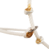 Knots and a metal ring on a white rope headsetter, seen up close. The noseband rope passes through the ring between knots with sealed ends.