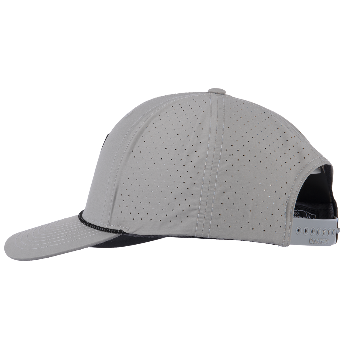 Silver performance hat seen from the side, showing the laser-perforated panels that bring airflow. The black rope runs along the bill, and a snap closure sits at the back.