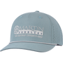 Smoke blue performance cap seen from the front at a slight angle. A light embroidered Martin Saddlery logo reads The Company Cowboys Keep on the structured crown, above a rope across the precurved bill.