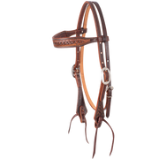 Weathered antique browband headstall with latigo ties, seen from the front quarter. A weave stamp covers the shaped browband and cheeks of the skirting leather, finished with cart buckles.