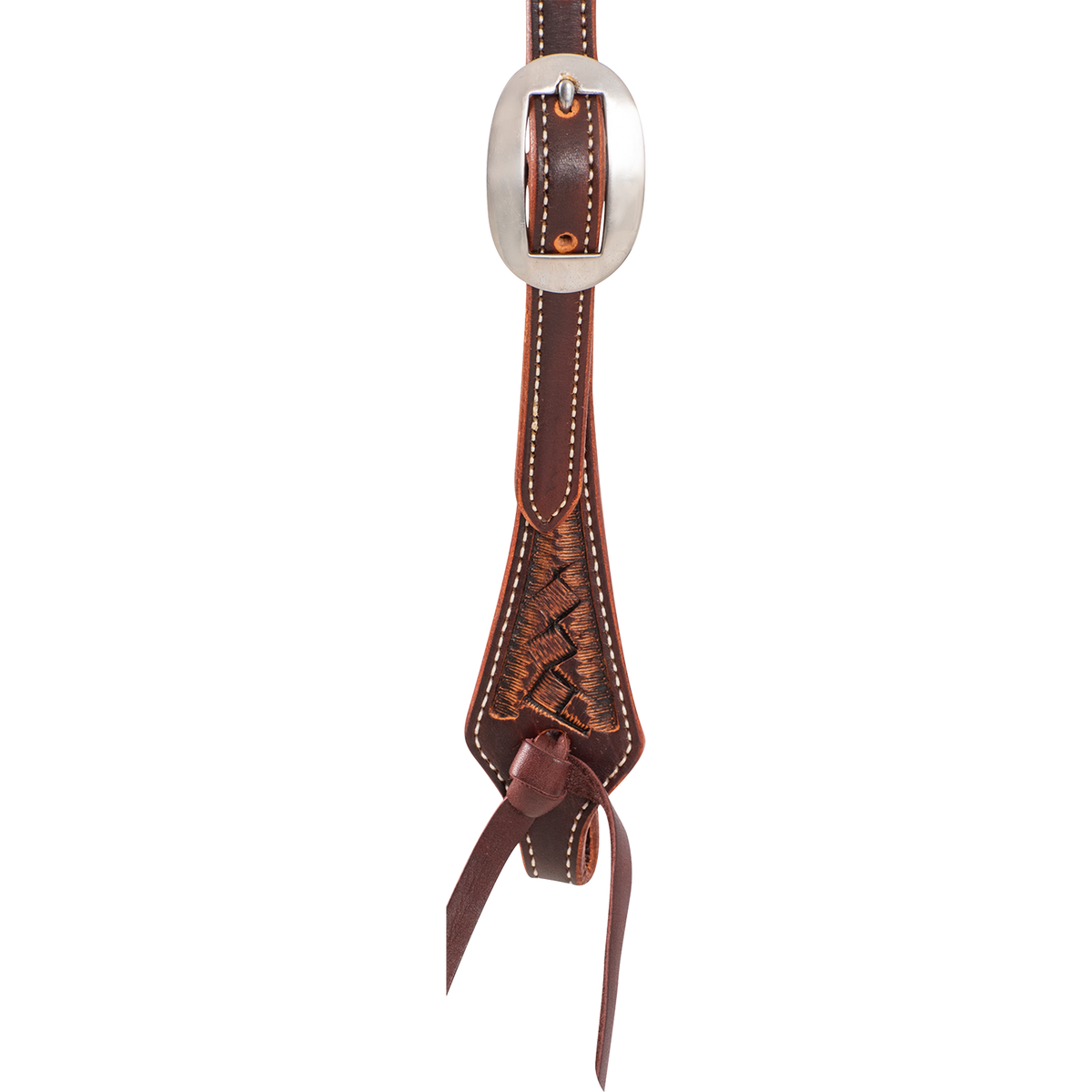 Weathered antique headstall cheek seen up close, with a cart buckle above a weave stamped end and a latigo tie. White stitching follows the edges of the cheek.