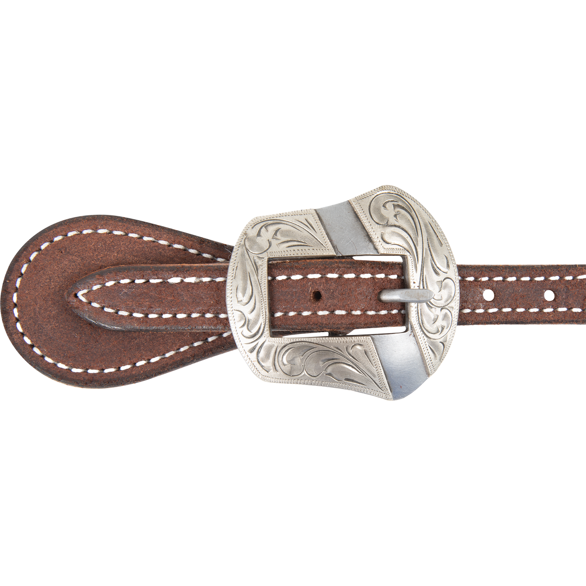 Salinas buckle on a chocolate roughout spur strap, seen up close. Scroll engraving covers the shaped buckle, with white stitching on the strap around it.