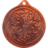 Round leather air freshener in a light reddish brown, seen from the front. Floral tooling with swirling leaves covers the face below the hanging hole.
